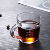 👉 Espresso apparaat small Heat-resistant glass measuring cup jigger for coffee Double-mouthed ounce 70ml milk XY021+