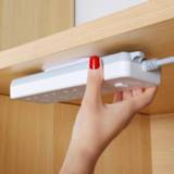 Router mannen Row plug holder wall-mounted wire seamless line board wall sticker socket buckle storage cable manager