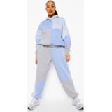 👉 Monochroom Colour Block Trainingspak Met Patches, Blue