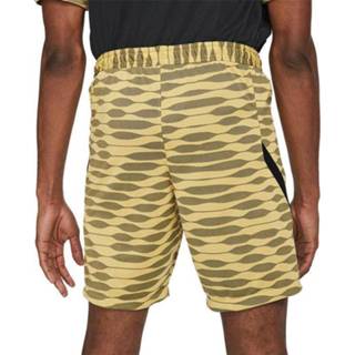 👉 Trainingsbroek l goud mannen voetbal male polyester Nike Trainingsbroekje dri-fit strike short saturn gold 194957267316 194957267323 194957267330