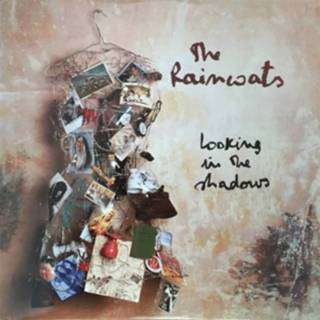 Regenjas Looking in the shadows. raincoats, cd 5022781204038