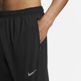 👉 Nike Dri-FIT UV Challenger Geweven hybride hardloopbroek voor heren - Zwart