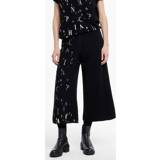 👉 Vrouwen zwart polyester comfort Gauchobroek - losse letters 5397189329615