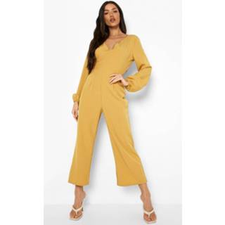 👉 Cullotte Jumpsuit Met Open Rug En Strik, Mustard