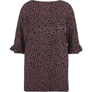 👉 Tuniek met volant