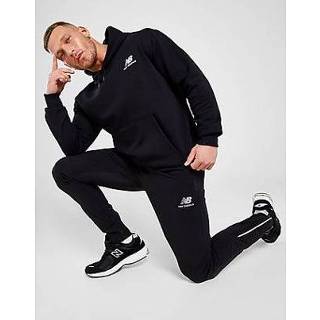 👉 New Balance Woven Track Pants