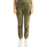 👉 L broeken vrouwen groen Nikkie Velvet track pants 8720175313508 8720175313461 8720175313478 8720175313485