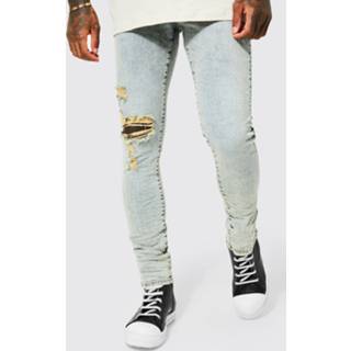 👉 Skinnyjeans Antique Blue Stretch Skinny Jeans Met Gescheurde Knieën En Gekreukelde Zoom,