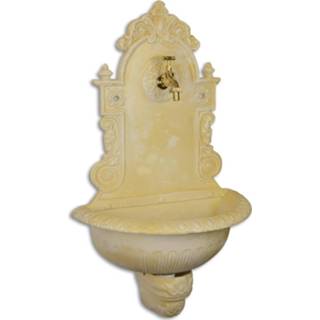 👉 A cast iron wall fountain